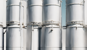 Health Risks of Dirty Water Tanks in Dubai Heat - professional technician inspecting water quality