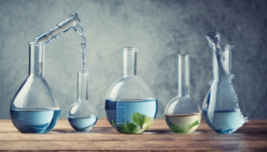 Professional water testing methods for tank safety - technician collecting water sample